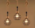 Suspension ampoule vintage au style industriel allumรฉe