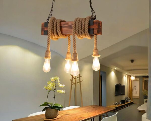 Suspension corde au style industriel en bois allumée dans une salle à manger