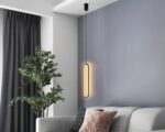 Suspension couloir au design minimaliste au-dessus d'un canapé
