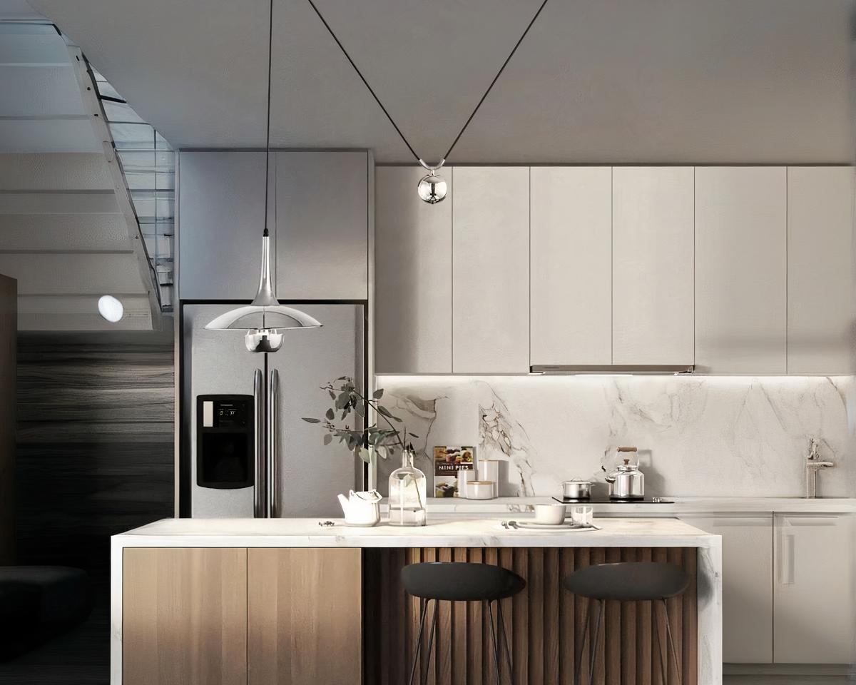 Suspension déportée design et moderne en métal allumée dans une cuisine