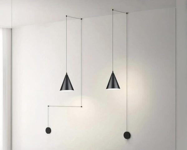 Suspension déportée noire moderne en aluminium allumée sur un mur