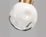 Suspension filaire chic et moderne en boule de verre