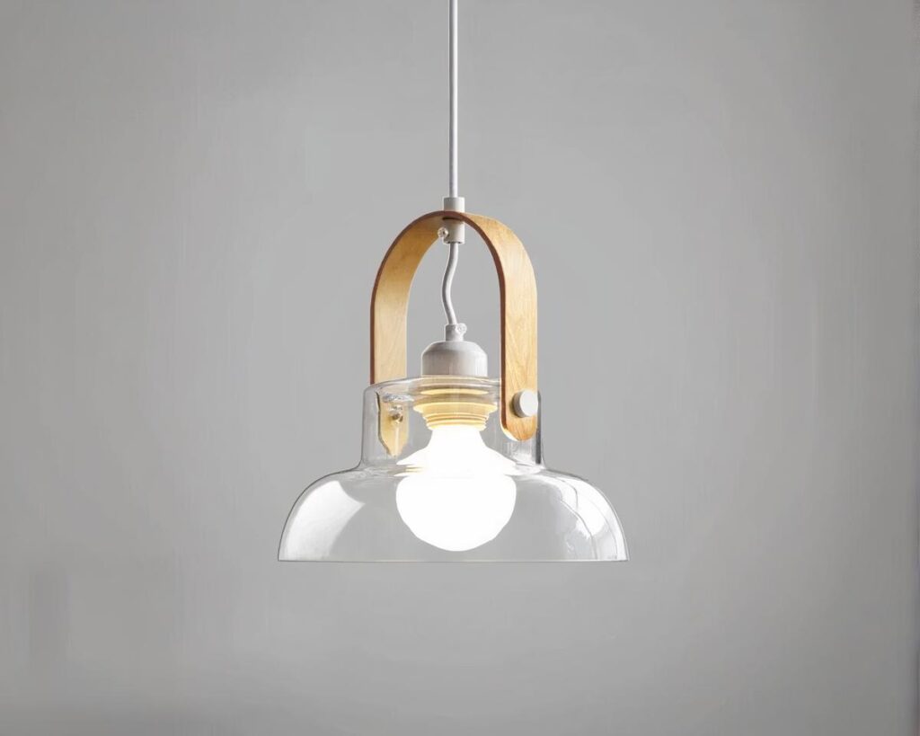 Suspension filaire élégante et moderne en verre allumée sur fond gris