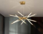 Suspension moderne LED dorée à 12 têtes sur un plafond