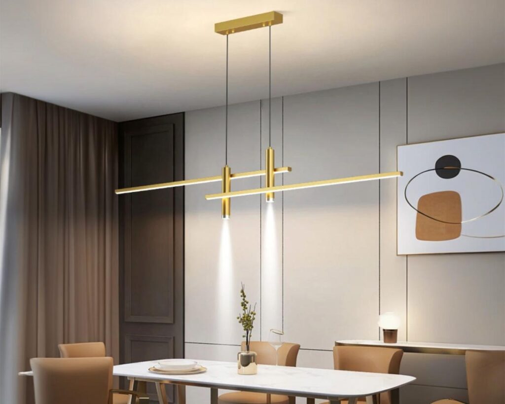Suspension moderne LED double et dorée en aluminium au-dessus d'une table