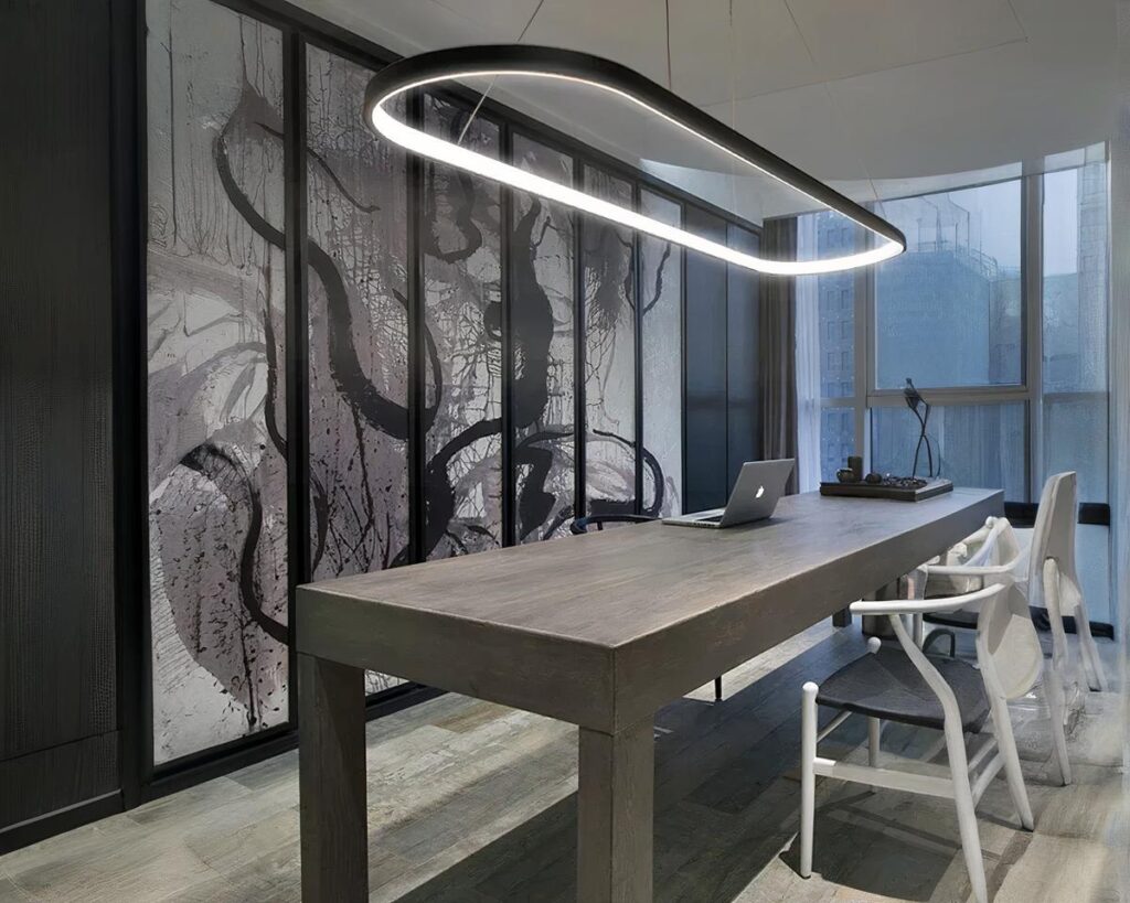 Suspension moderne LED en forme d'épingle au-dessus d'une table