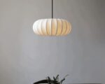 Suspension papier moderne de style nordique sur fond gris.