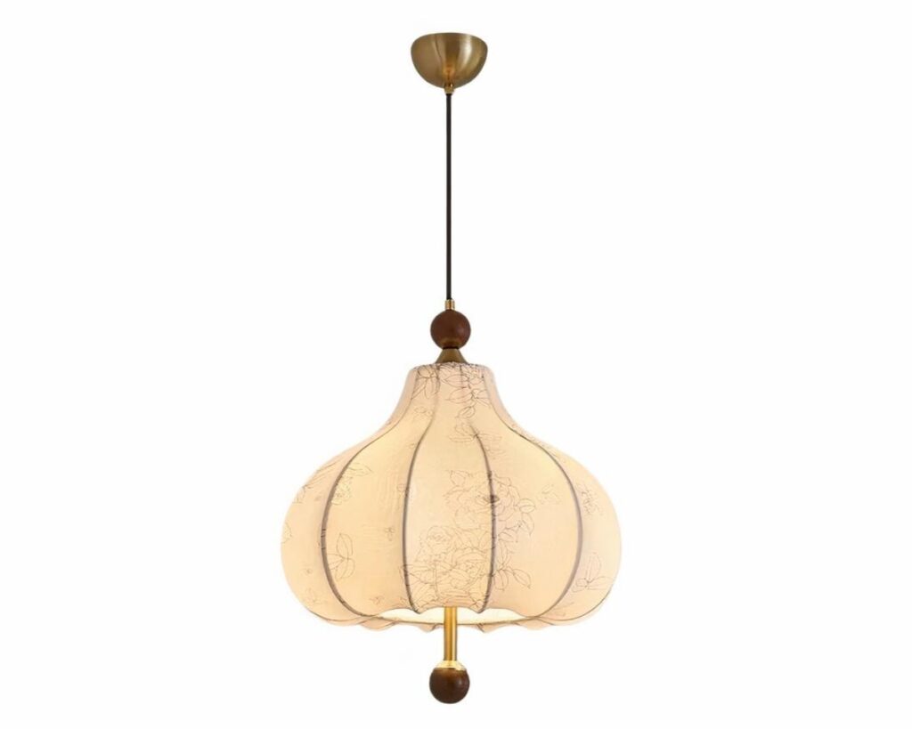 Suspension tissu LED vintage avec motif floral sur fond blanc.