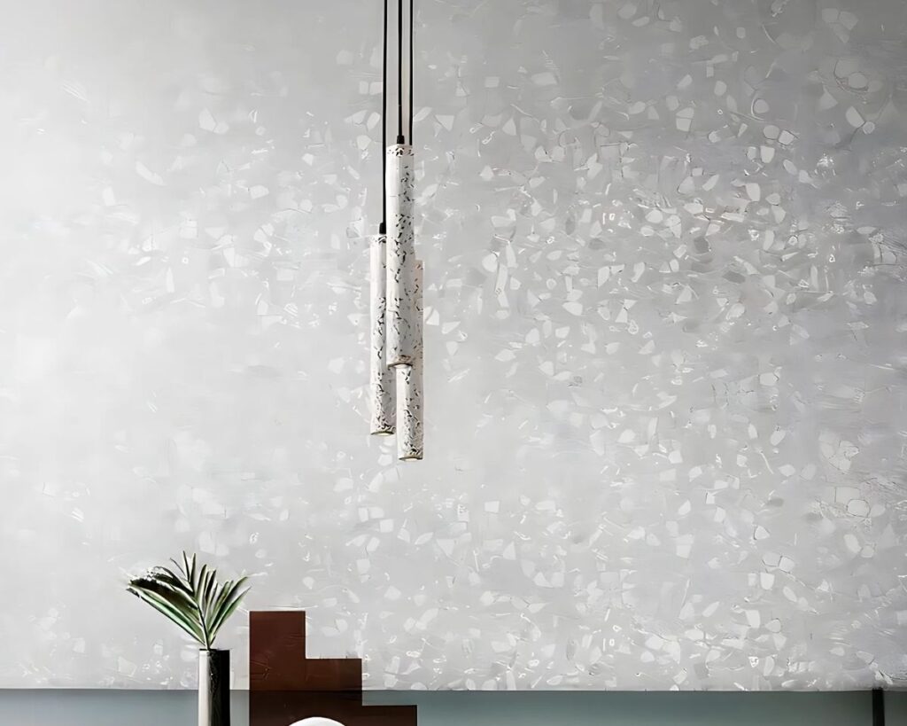 Suspension tube fine et raffinée au design moderne blanche sur fond blanc.