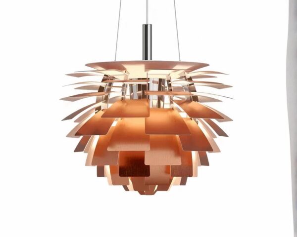 Suspension cuivre rose au design artistique sur fond blanc