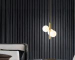 Suspension nordique dorée au design luxueux sur fond noir